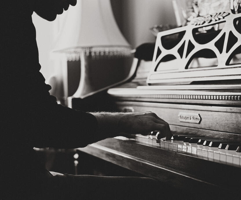 A picture of a music therapy session using guitars to make up songs.